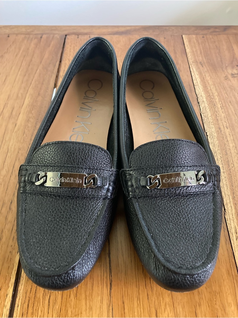 Calvin Klein Black Pebbled Leather Loafers with Silver Logo Accent